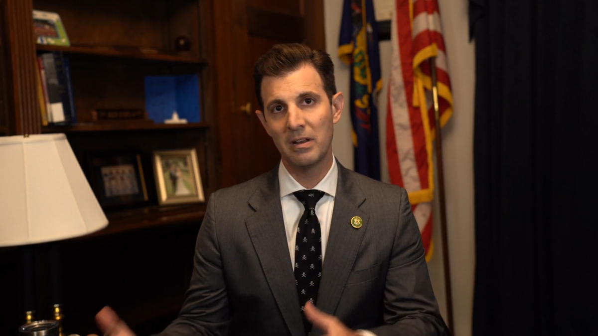 Congressman Deluzio speaks directly to camera in his office