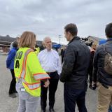 Congressman Chris Deluzio speaks with fellow congressmembers and EPA officials at Norfolk Southern derailment site