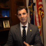 Congressman Deluzio speaks directly to camera in his office