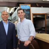 Rep. Deluzio and Leaders Jeffries smile for a photo at Nancy's Revival in Wilkinsburg, PA.