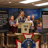 A photo of Congressman Deluzio speaking at a press conference