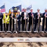 A photo of Congressman Deluzio and local leaders posing with shovels to celebrate the groundbreaking of a new factory