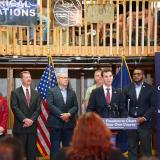 A photo of Congressman Deluzio speaking at a press conference about investing $61 million in the PA state budget for apprenticeships and career & technical education